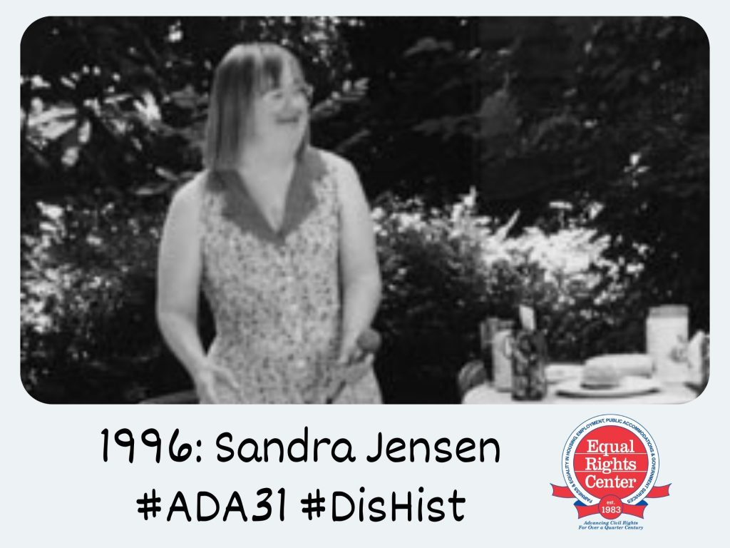 Polaroid-style photograph of Sandra Jensen smiling outdoors. Captioned, 1996: Sandra Jensen #ADA31 #DisHist